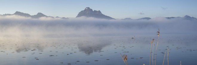 Sunrise at Lake Hopfensee near Füssen, with the Tegelberg massif and the Säuling behind it,