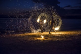 Fire show, jugglers with fire, Ao Nang Beach, sunset, Ao Nang, Krabi, Thailand