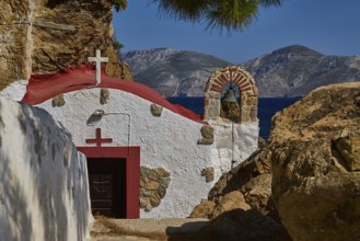 Legend, Crab, Mussel fisherman, White-red chapel in rocky landscape with view of the sea,