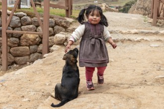 Girl with dog, Chinchero, Sacred Valley, Peru