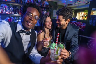 Cheerful friends raise glasses of mojitos, enjoying a vibrant night out at a trendy pub, creating