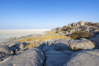 Round rocks of Kubu Island with view over the salt pan, Kubu Island (Lekubu), Sowa Pan,