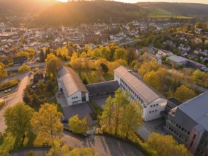 View over a cityscape at sunset with striking buildings, Nagold, Black Forest, Germany