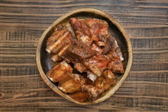 Tender short beef ribs are perfectly roasted in the oven, showcasing a rich, savory flavor. The