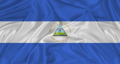Flag of Nicaragua with cloth texture. Close up of Nicaraguan flag waving