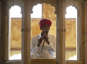 Rajasthani folk musician with an alghoza or bamboo flute, Jaisalmer, Rajasthan, India