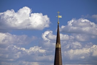 Spire of the main church St Katharinen with clouds, Hamburg, Germany