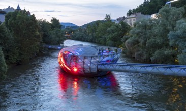Murinsel floating island on the river Mur by night, Graz, Austria