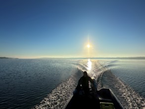 View from a motorboat over Lake Starnberg, Bavaria, Germany