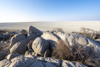 Round rocks of Kubu Island with view over the salt pan, Kubu Island (Lekubu), Sowa Pan,