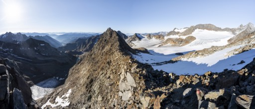Rocky ridge, ascent to the Wilder Freiger, summit of the Becher with Becherhaus at the back,
