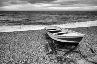 Boat, rowing boat, lies on the beach, pebble beach, Étretat, sea, clouds, black and white,