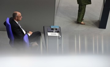 Federal Chancellor Friedrich Merz (CDU) and parts of his cabinet sit on the government bench,