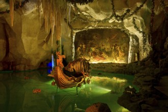 Venus Grotto by King Ludwig II, artificial stalactite cave, lake with boat, painting Tannhäuser bei