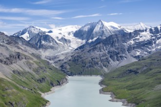 Blue mountain lake in a mountain landscape with glaciers, Lac des Dix reservoir and Mont Blanc de