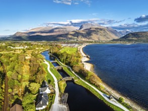View of Caledonian Canal, Caol Beach and Nevis Range Mountains from a drone, Corpach, Fort William,