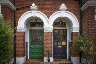 Victorian house entrances, blue and green doors, brick building, Kensington, London, England, Great