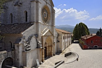 Main façade with rose window and portal, Gothic basilica of the Cistercian abbey of Fossanova