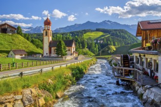 Chaplaincy church and old forge with water wheel on the Horlachbach, Niederthai in the Horlach