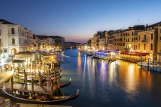 View of the Grand Canal at the blue hour, picturesque evening mood with illuminated palazzos on the