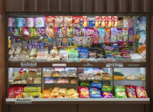 Shop stall selling sweets and snacks, Sao Bento railway station, Porto, Portugal