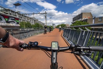 Ride over the Snelbinder Brug bicycle and pedestrian bridge, over the river Waal near Nijmegen, was