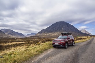 4x4 cars in Glen Etive Valley, Highlands, Scotland, UK