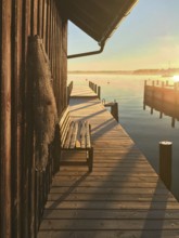 Evening atmosphere, view from a boathouse onto Lake Starnberg, Bavaria, Germany