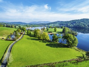 Farms over Esthwaite Water from drone, Lake District National Park, Cumbria, UK