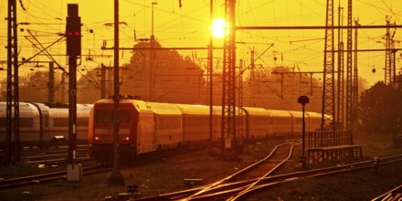 Travelling trains at sunrise, Central Station, Dortmund, Ruhr Area, Germany