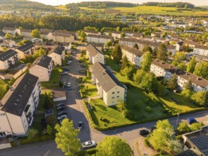 View of a spacious residential area with green spaces and surrounding landscape, Calw, Black
