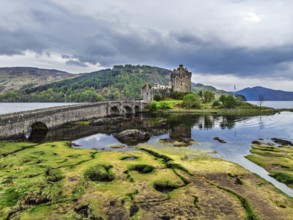 Eilean Donan Castle and Loch Duich from a drone, Isle of Skye, Highlands, Scotland, England, United