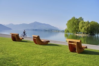 Wooden loungers on Lake Zug, behind the Rigi, Villette, Park, Cham, Canton Zug, Switzerland