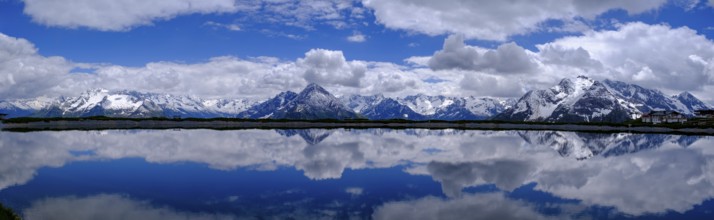 Mountain lake with alpine panorama, snow pond Finkenberg, Penken, Mayrhofen, Zillertal, Tyrol,