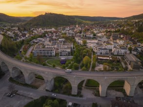 Panoramic view of a town with viaduct and buildings in the evening, Nagold, district of Calw,