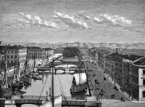 Old town of Gothenburg at the river Göta älv, wide promenade, bridges, numerous cargo ships,
