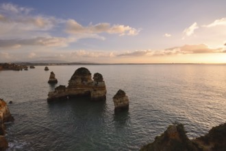 Rocky coast at sunrise, Praia do Camilo, Lagos, Algarve, Portugal
