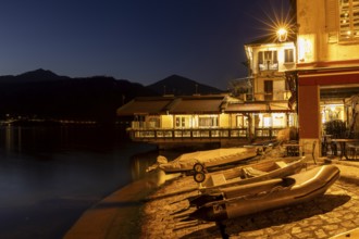 Cafe with fishing boats, Orta San Giulio, on Lake Orta, Province of Novara, Piedmont, Lago d'Orta,