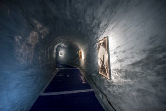 Artificial ice cave through the glacier ice, Mer de Glace, Montenvers, Chamonix, Haute-Savoie,