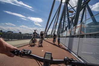 Ride over the Snelbinder Brug bicycle and pedestrian bridge, over the river Waal near Nijmegen, was