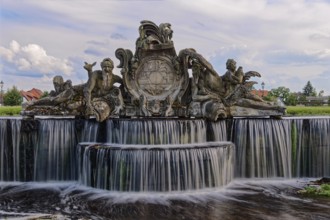 Bassin, a water basin, in front of Ludwigslust Palace, with cascades and stone figures.