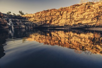 Bell Gorge waterfall, a body of water in north-west Australia in the Kimberley. Sunrise in the