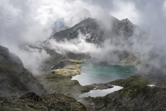 Mountain lakes Wangenitzsee and Kreuzsee, cloudy mountain peaks in the morning, Schober group, Hohe