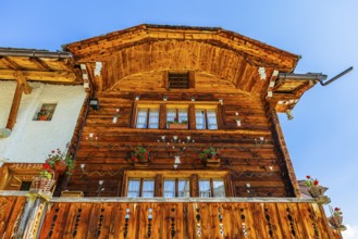 Parsonage, decorated with flowers, historic village centre, Grimentz, Val d'Anniviers, Valais Alps,