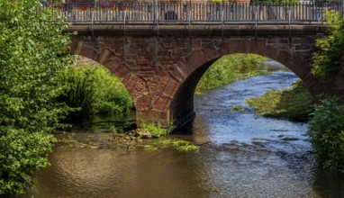 The old town centre with the town wall and the Seemenbach stream, Büdingen, Hesse, Germany