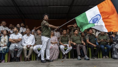Members of Indian National Congress celebrate after Indian armed forces carried out Operation
