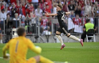 Goal celebration Lennart Karl Bayern Munich FCB (46) Goalkeeper Guglielmo Vicario Tottenham Hotspur