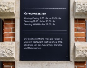 Sign at the entrance to a restaurant on Hausvogteiplatz, Berlin, Germany