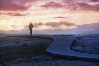 Lone walker on wooden path, sulphur vapour, Hveravellir geothermal area, sunset, illustration,