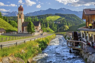 Chaplaincy church and old forge with water wheel on the Horlachbach, Niederthai in the Horlach